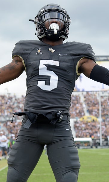 Milton accounts for 3 TDs, No. 11 UCF beats Navy 35-24